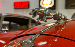 Close-up shot of the Jaguar hood ornament, the Jaguar Leaper.